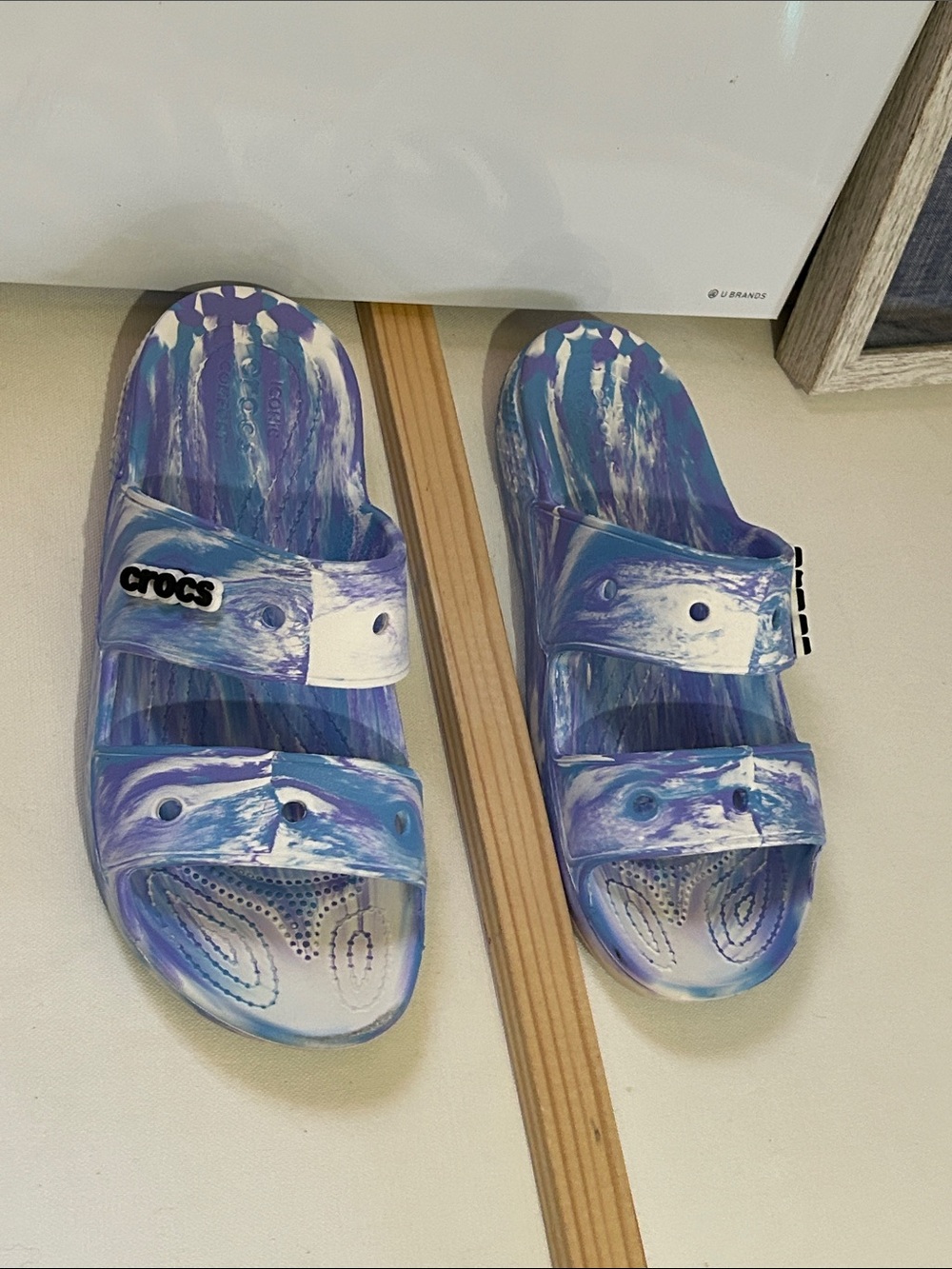 CROCS women’s and Double Strap Slide Sandals in Blue & White Swirl